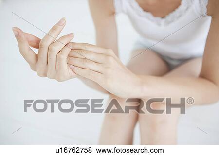 Stock Photo - Young Woman's Hands. Fotosearch