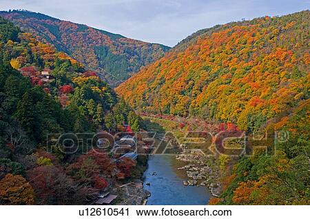 Stock Image - Arashiyama in Autumn, Kyoto Prefecture, Honshu, Japan. Fotosearch
