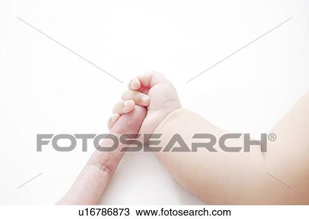 Baby holding mother's hand View Large Photo Image Stock Image - Baby holding mother's hand. Fotosearch