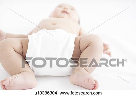 Picture - Baby lying on back. Fotosearch