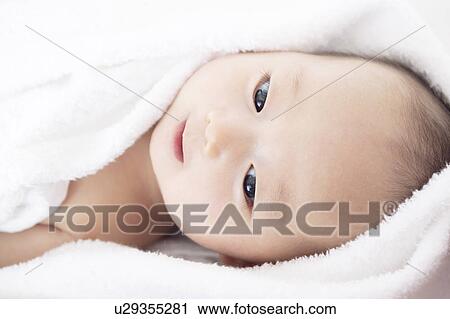 Baby lying on back View Large Photo Image Stock Image - Baby lying on back. Fotosearch