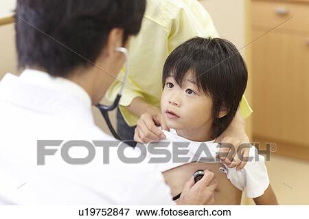 Boy and Mother in Doctor's Office View Large Photo Image Stock Photo - Boy and Mother in Doctor's Office. Fotosearch