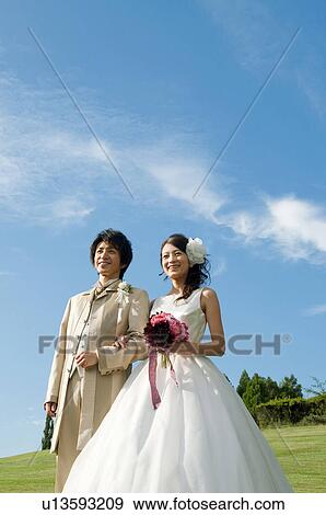 Bride and bridegroom arm in am View Large Photo Image Stock Photo - Bride and bridegroom arm in am. Fotosearch