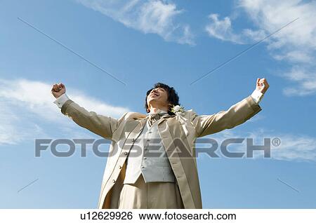 Stock Photograph - Bridegroom making fists. Fotosearch