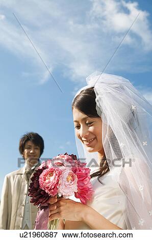 Bridegroom watching bride View Large Photo Image Stock Photo - Bridegroom watching bride . Fotosearch