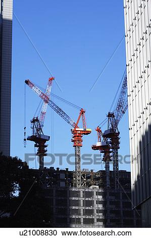 Building under construction and crane, Chiyoda Ward, Tokyo Prefecture, Honshu, Japan View Large Photo Image Stock Image - Building under construction and crane, Chiyoda Ward, Tokyo Prefecture, Honshu, Japan. Fotosearch