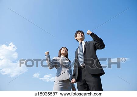 Stock Photo - Business people making fists. Fotosearch