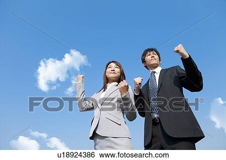 Business people making fists View Large Photo Image Stock Photograph - Business people making fists. Fotosearch