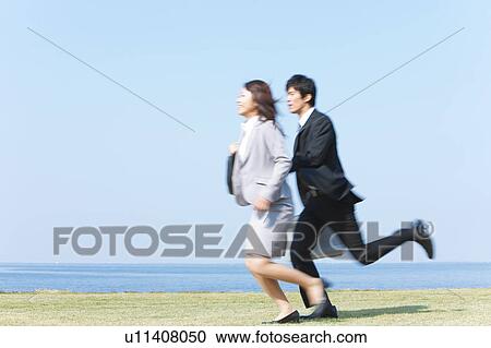 Business people running View Large Photo Image Stock Image - Business people running. Fotosearch