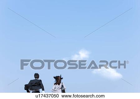 Stock Image - Business people running. Fotosearch