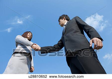Business people shaking hands View Large Photo Image Stock Image - Business people shaking hands. Fotosearch