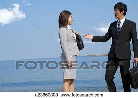 Business people talking View Large Photo Image Stock Photo - Business people talking. Fotosearch