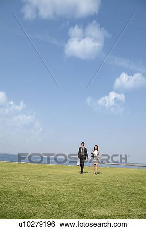 Business people walking View Large Photo Image Stock Photograph - Business people walking. Fotosearch
