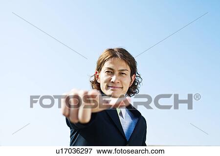 Stock Photo - Businessman Pointing. Fotosearch