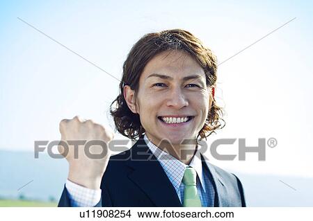 Businessman Raising Fist View Large Photo Image Picture - Businessman Raising Fist. Fotosearch