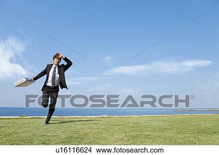 Businessman running View Large Photo Image Picture - Businessman running. Fotosearch