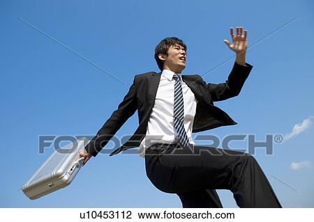 Businessman running View Large Photo Image Stock Image - Businessman running. Fotosearch