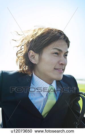 Stock Image - Businessman Running. Fotosearch