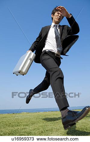 Businessman running View Large Photo Image Stock Image - Businessman running. Fotosearch