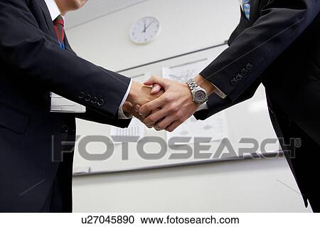 Businesspeople shaking hands View Large Photo Image Stock Image - Businesspeople shaking hands. Fotosearch
