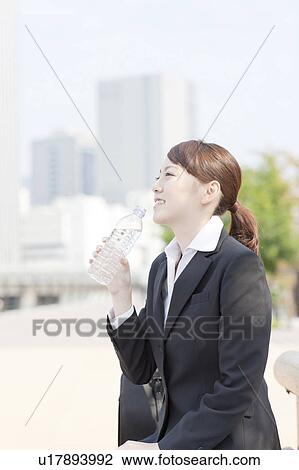 Businesswoman Drinking Water View Large Photo Image Stock Image - Businesswoman Drinking Water. Fotosearch
