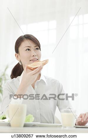 Businesswoman Having Breakfast View Large Photo Image Stock Photo - Businesswoman Having Breakfast. Fotosearch