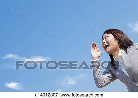 Stock Photo - Businesswoman shouting. Fotosearch
