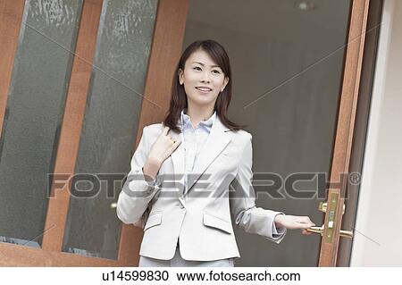Businesswoman Walking Through Door View Large Photo Image Stock Image - Businesswoman Walking Through Door. Fotosearch