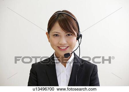 Businesswoman with headset View Large Photo Image Stock Image - Businesswoman with headset. Fotosearch