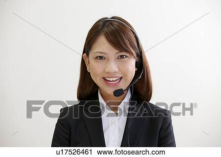 Businesswoman with headset View Large Photo Image Stock Image - Businesswoman with headset. Fotosearch