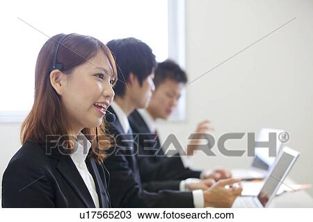 Businesswoman with headset View Large Photo Image Stock Image - Businesswoman with headset. Fotosearch