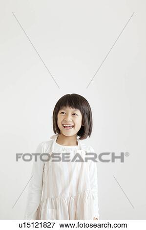 Stock Photo - Cheerful Young Girl. Fotosearch