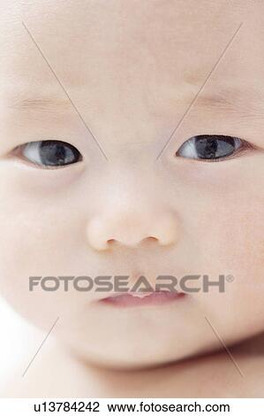 Close-up of baby's face View Large Photo Image Stock Image - Close-up of baby's face. Fotosearch