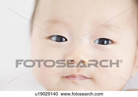 Close-up of baby's face View Large Photo Image Stock Image - Close-up of baby's face. Fotosearch