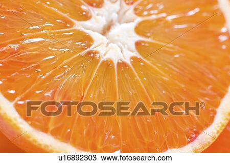 Stock Image - Close-up of Tarocco orange. Fotosearch