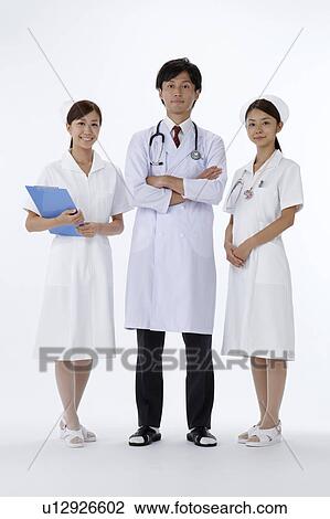 Doctor and Two Nurses View Large Photo Image Stock Image - Doctor and Two Nurses. Fotosearch