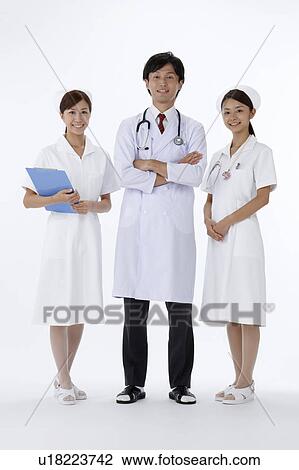 Stock Image - Doctor and Two Nurses. Fotosearch