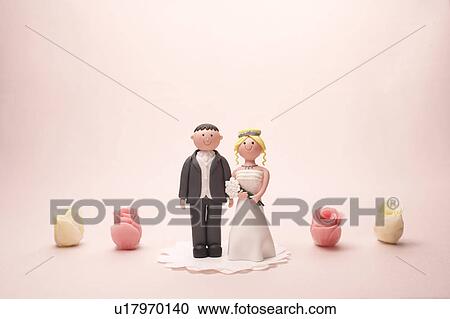 Figurine of bride and groom View Large Photo Image Stock Image - Figurine of bride and groom. Fotosearch
