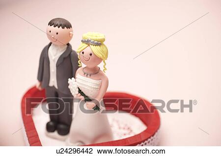 Figurine of bride and groom View Large Photo Image Stock Image - Figurine of bride and groom. Fotosearch
