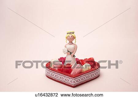 Stock Image - Figurine of bride. Fotosearch