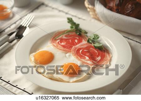 Fried eggs and ham View Large Photo Image Stock Photography - Fried eggs and ham. Fotosearch