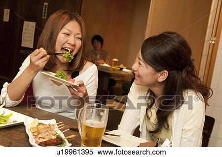 Friends at a bar View Large Photo Image Stock Photography - Friends at a bar. Fotosearch