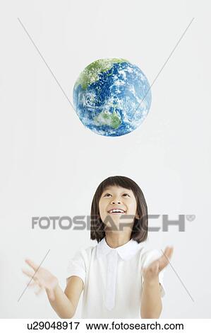 Girl Throwing Globe View Large Photo Image Stock Photo - Girl Throwing Globe. Fotosearch