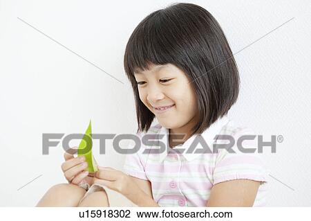 Girl with Leaf View Large Photo Image Stock Image - Girl with Leaf. Fotosearch