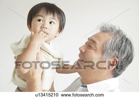 Stock Image - Grandfather and Grandson. Fotosearch