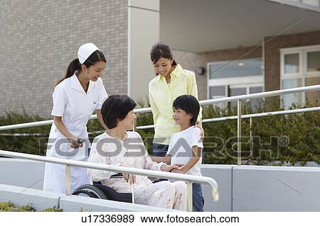 Stock Photo - Grandmother with Grandson, Daughter and Nurse. Fotosearch
