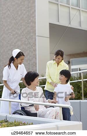 Grandmother with Grandson, Daughter and Nurse View Large Photo Image Stock Photo - Grandmother with Grandson, Daughter and Nurse. Fotosearch