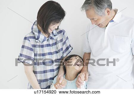 Grandparents and granddaughter holding hands View Large Photo Image Stock Image - Grandparents and granddaughter holding hands. Fotosearch