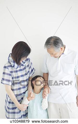 Grandparents and Granddaughter View Large Photo Image Stock Photo - Grandparents and Granddaughter. Fotosearch