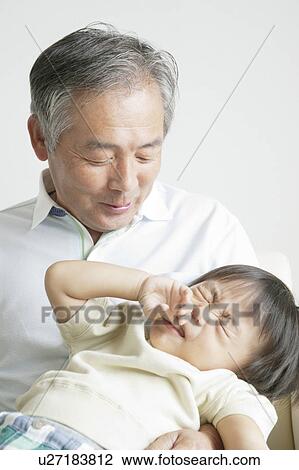 Stock Image - Grandson and Grandfather. Fotosearch